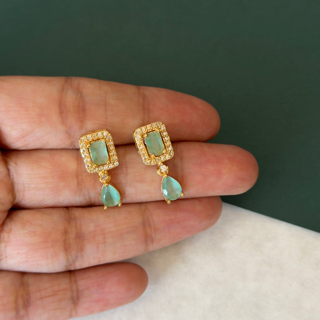 Mint green CZ necklace on a display bust