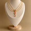 Triple Strand Pearl Necklace with Baby Pink Pendant