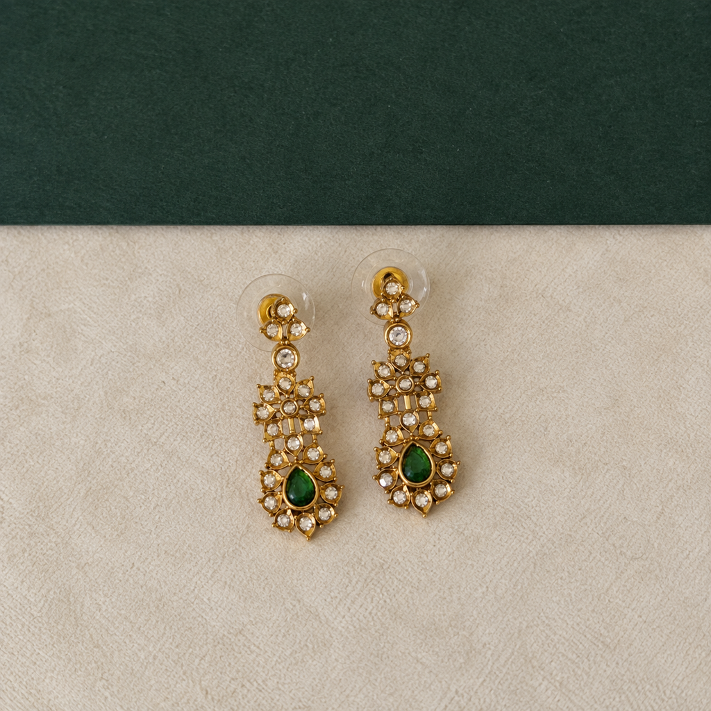 Antique gold floral drop earrings with green stone