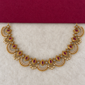 Pair of gold-tone drop earrings with ruby-color and clear stone accents