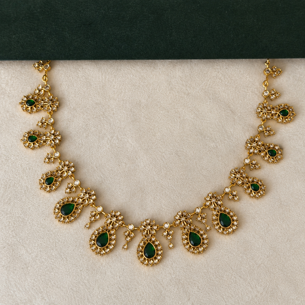 Antique gold necklace with emerald green teardrop stones